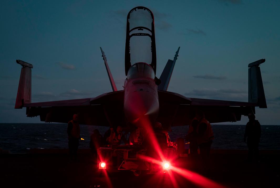 An F/A-18E Super Hornet takes off from the flight deck of USS Dwight D. Eisenhower (CVN 69)